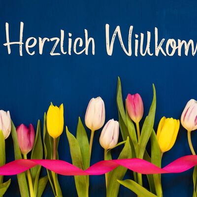 Herzlich willkommen mit Tulpen
